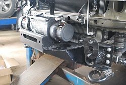 Toyota Tundra 2012 год, 5.7 L, лебедки Master Winch 12500 спереди и сзади в штатных бамперах, Боди лифт 5см, защита днища 8мм алюминий, пневмо подвеска, свет Prolight, колеса 35*12,5*18,
силовой обвес, лаборатория полного привода, площадка под лебедку, защита днища, боди лифт, лебедка в штатный бампер