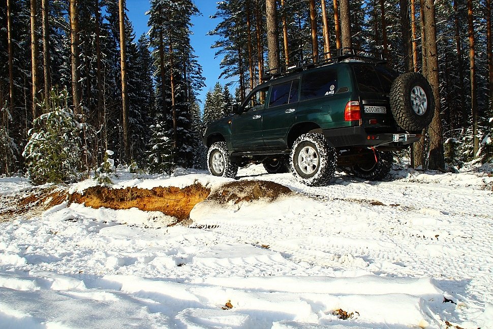 Внедорожная подготовка Toyota land Cruiser 105. Силовой задний бампер TLC 105. Лифтованная Toyota Land Cruiser 105.