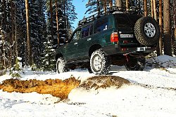 Внедорожная подготовка Toyota land Cruiser 105. Силовой задний бампер TLC 105. Лифтованная Toyota Land Cruiser 105.