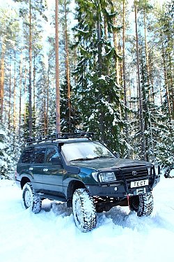 Внедорожная подготовка Toyota land Cruiser 105. Передний силовой бампер TLC 105. Силовые пороги. Экспедиционный багажник.
