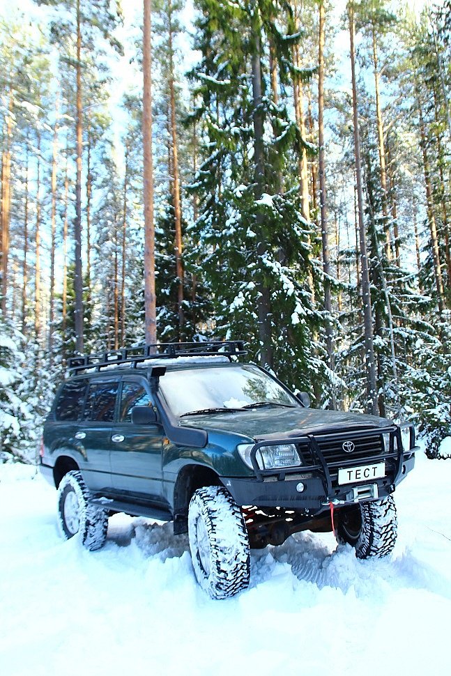 Внедорожная подготовка Toyota land Cruiser 105. Передний силовой бампер TLC 105. Силовые пороги. Экспедиционный багажник.