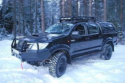 Силовой обвес Toyota Hilux передний бампер, пороги, экспедиционный багажник