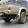 Силовой бампер задний Mitsubishi L200 III (трубный)